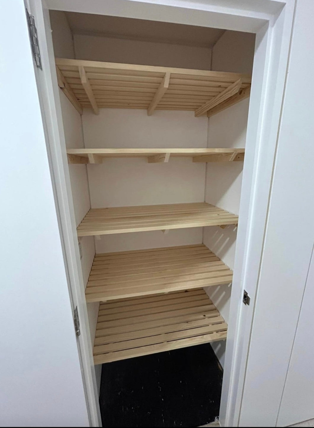 tailored storage shelves for boiler cupboard