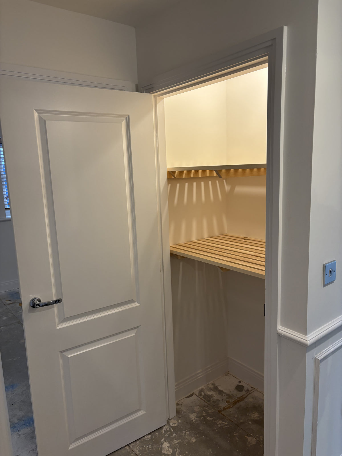 After fitted shelves installed